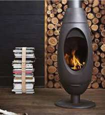 Печь-камин Invicta OVE стальная в интерьере Амазонка бай фото в Новополоцке