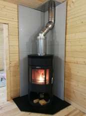 Недорогой камин с отделкой шамотом Сибирь 12 фото в интерьере в Новополоцке