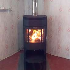 Недорогой камин с отделкой шамотом Сибирь 12 фото в интерьере в Новополоцке