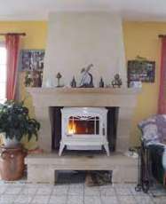 Печь-камин чугунный Invicta Bradford в интерьере Амазонка бай фото в Новополоцке