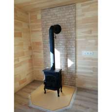 Чугунный камин со стеклом Сибирь 7 фото в интерьере в Новополоцке