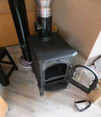 Недорогой печь-камин со стеклом Сибирь 6 фото в интерьере в Новополоцке