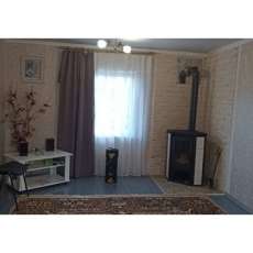 Стальной камин с шамотом Мета-Бел Ритм L фото в интерьере в Новополоцке