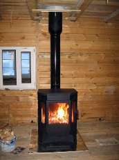 Печь-камин Бавария водяной с плитой в интерьере в Новополоцке