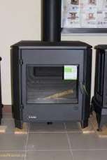 Печь-камин чугунный Invicta Carolo в интерьере Амазонка бай фото  в Новополоцке