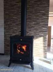 Печь-камин чугунный Invicta Altea в интерьере Амазонка бай фото в Новополоцке