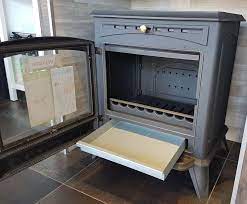 Печь-камин чугунный Invicta Altea в интерьере Амазонка бай фото в Новополоцке