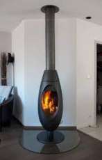 Печь-камин чугунный Invicta Ove в интерьере Амазонка бай фото в Новополоцке