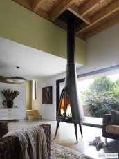 Печь-камин чугунный Invicta Pow-Wow в интерьере Амазонка бай фото в Новополоцке