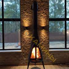 Печь-камин чугунный Invicta Pow-Wow в интерьере Амазонка бай фото в Новополоцке