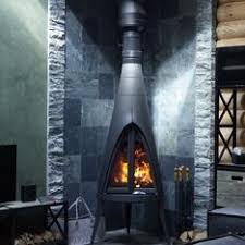 Печь-камин чугунный Invicta Pow-Wow в интерьере Амазонка бай фото в Новополоцке