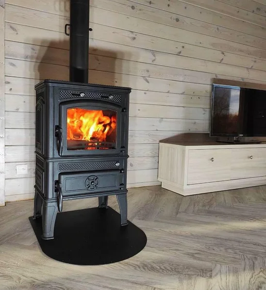 Печь-камин чугунный FireWay Dacha в интерьере с варочной поверхностью патина бронза Амазонка бай фото в Новополоцке